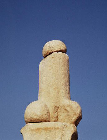 A giant phallus stands outside the Sanctuary of Dionysus on the Delos