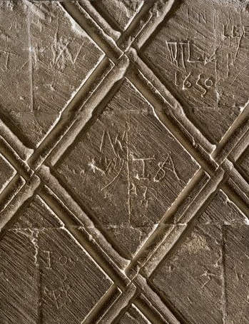 Graffiti on Norman early 12th century stonework, Canterbury Cathedral