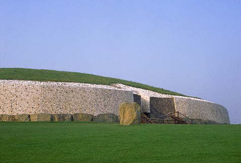 Large flat stones surround the base of the burial mound at Newgrange