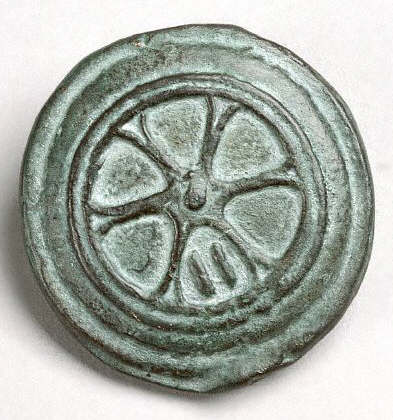 Ancient European Coin With a Six-Spoked Wheel