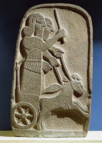 Stele of two Assyrians Driving a Chariot